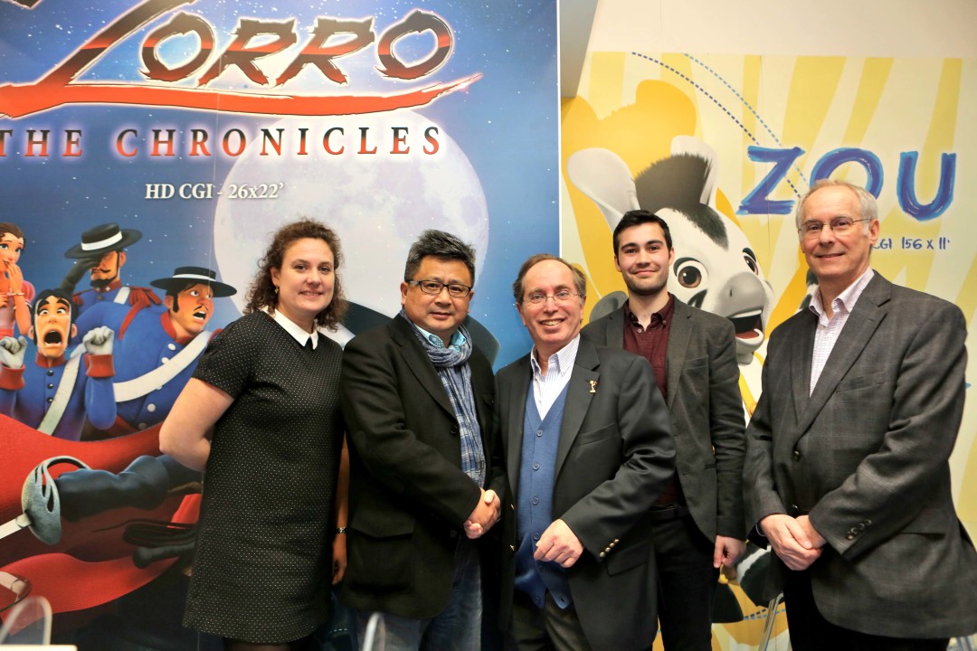 Cyber Group Studios and Wekids executives celebrate their 130 hour content deal