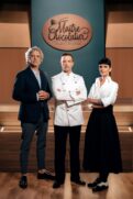 Judges and host standing on the set of Maître Chocolatier – Talenti in Sfida, a chocolate-making competition show