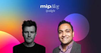 Promotional MIPBlog Spotlight banner featuring Brad Reilly and Gautham Narayanan from VIRTUE against a colourful gradient background.
