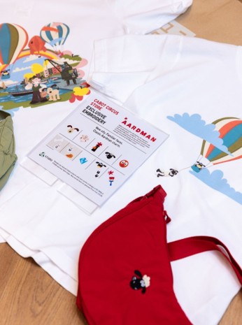 Promotional activity kit inspired by Aardman characters, featuring illustrated worksheets, branded materials and themed accessories designed for children and families.